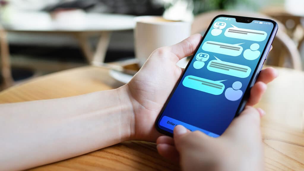 Customer and chatbot dialog on smartphone screen